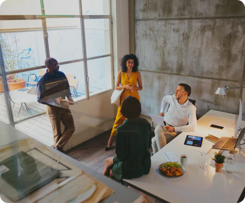 Four people in an office