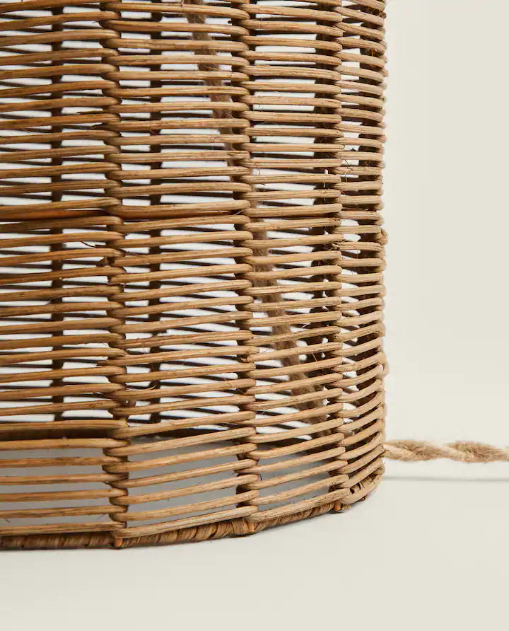 Closeup of the bottom of a rattan lamp