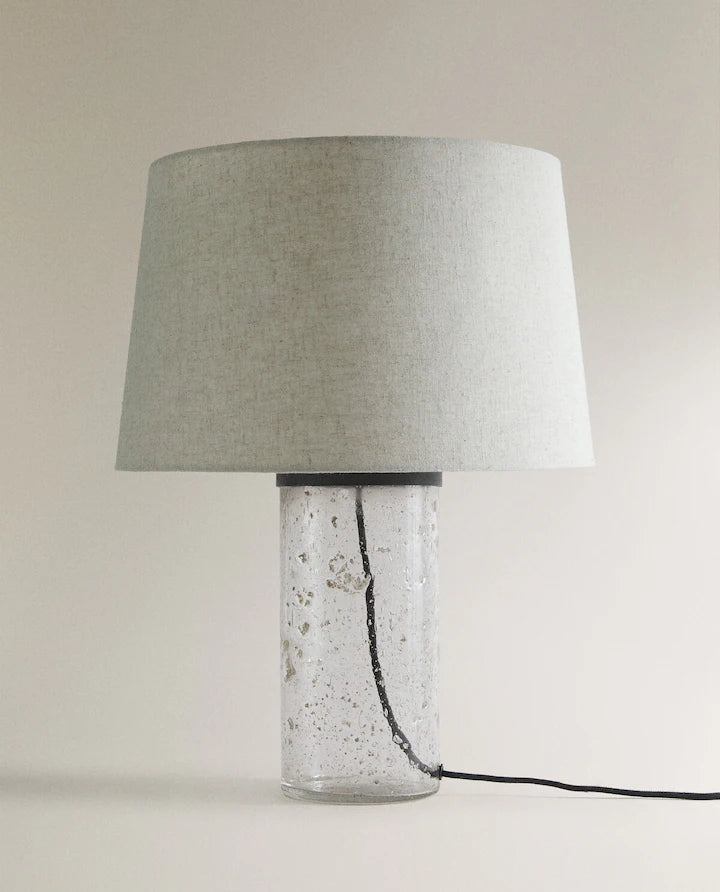 Lamp with glass base